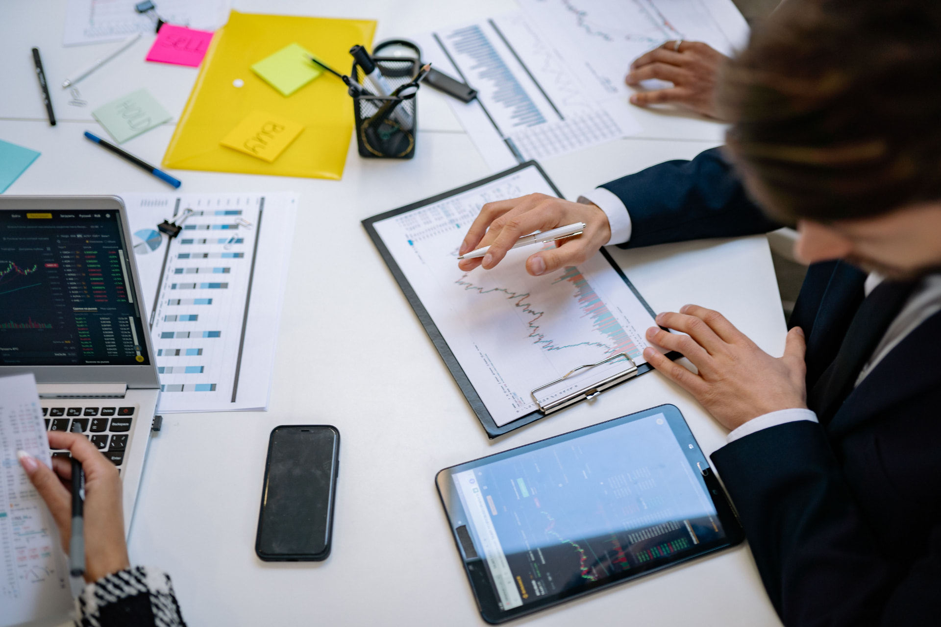 Analysts reconciling printed records against digital data